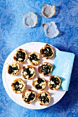Shortcrust tartlets with spinach and feta cheese