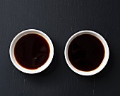 Soy sauce and tamari sauce in small bowls