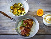 Stuffed orange and veal escalope with Parma ham and fried courgette