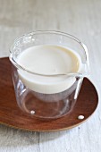 Soya cream in a glass jug