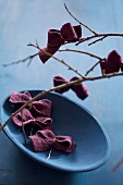 Felt bows on branch and in blue bowl