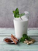 Cucumber smoothie with almond milk, coconut milk and mint
