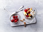 Nectarine and raspberry salad with soy yoghurt and walnuts