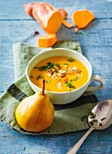 Sweet potato soup with pears and hazelnuts