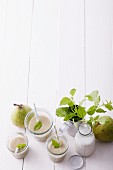Pear and fig smoothies with an oat drink and lemon balm
