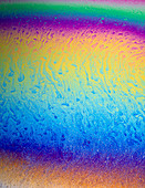 Soap bubble with light interference patterns