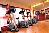 Woman using an exercise bike