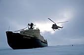 Arctic icebreaker and helicopter