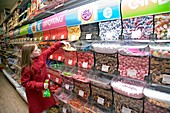 Girl choosing sweets