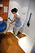 Cleaning the bathroom in a care home