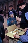 Street children food handout,Romania