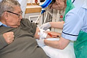 Man undergoing kidney dialysis