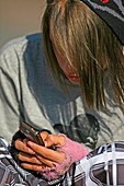 Teenager using a mobile phone
