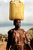 Woman carrying water,Uganda