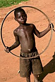 Child playing with a hoop,Uganda