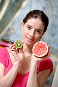 Woman holding fruit