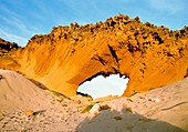 Natural arch in sand dunes