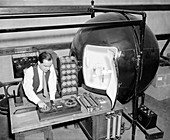 Testing lightbulbs,historical image