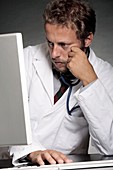 Doctor working on a computer