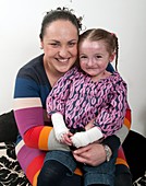 Girl with epidermylosis bullosa & mother