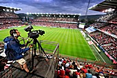 Football match cameraman