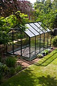 Domestic greenhouse in garden