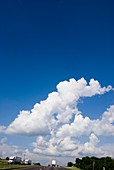 American road,clouds and blue sky