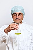 Scientist holding a flask