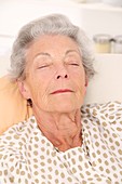 Elderly woman resting