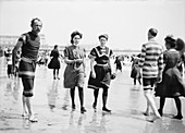 Lifeguard and beach visitors,1880-1906