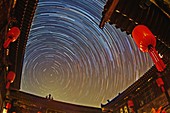 Polar star trails over Chinese courtyard