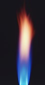 Bright blue and orange flame of bunsen