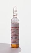 Ampoule of antivenin serum,orange liquid