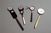 Four ophthalmoscopes,19th century