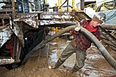 Dismantling a natural gas drilling rig