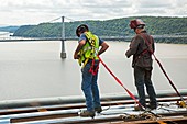 Bridge lift construction workers
