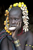 Young Mursi Girl with lip plate inserted