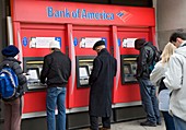 People using cash machines