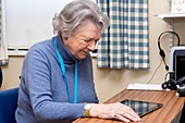 Senior woman undergoing a memory test