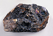 Rough samarskite mineral