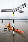 Kayakers in the flood waters