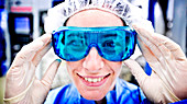 Scientist wearing protective goggles
