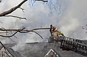 Firefighters attending a house fire