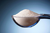 Salt in a measuring spoon