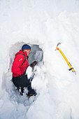 Mountaineers building snow holes