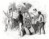 Hand-powered threshing machine