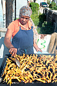 Chickens' feet on a barbecue