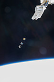 ISS deploying satellites