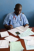 Doctor with patient notes,Sierra Leone
