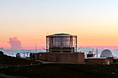 Sunset over Haleakala observatories